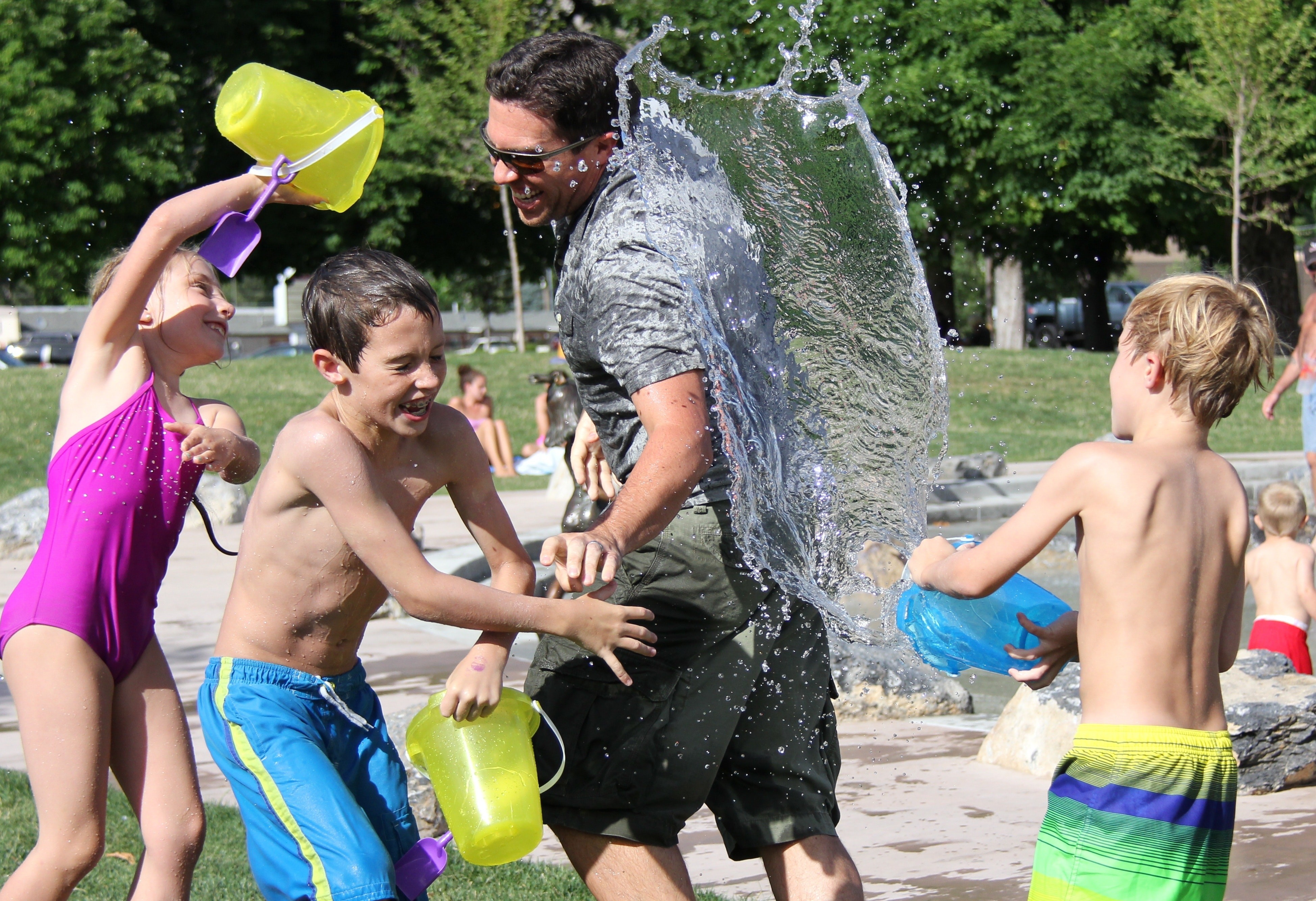 dad playing with kids